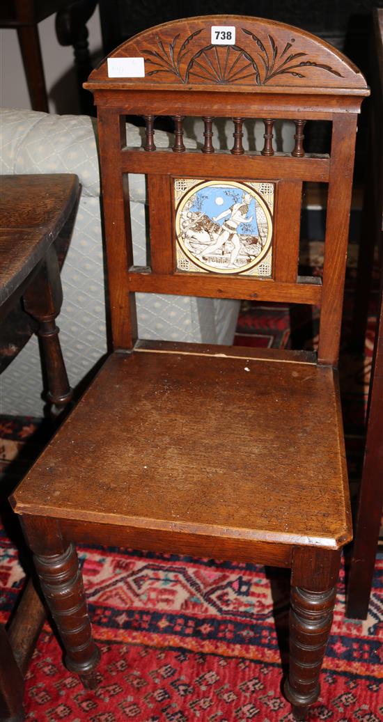 A pair of late Victorian Morris style oak hall chairs